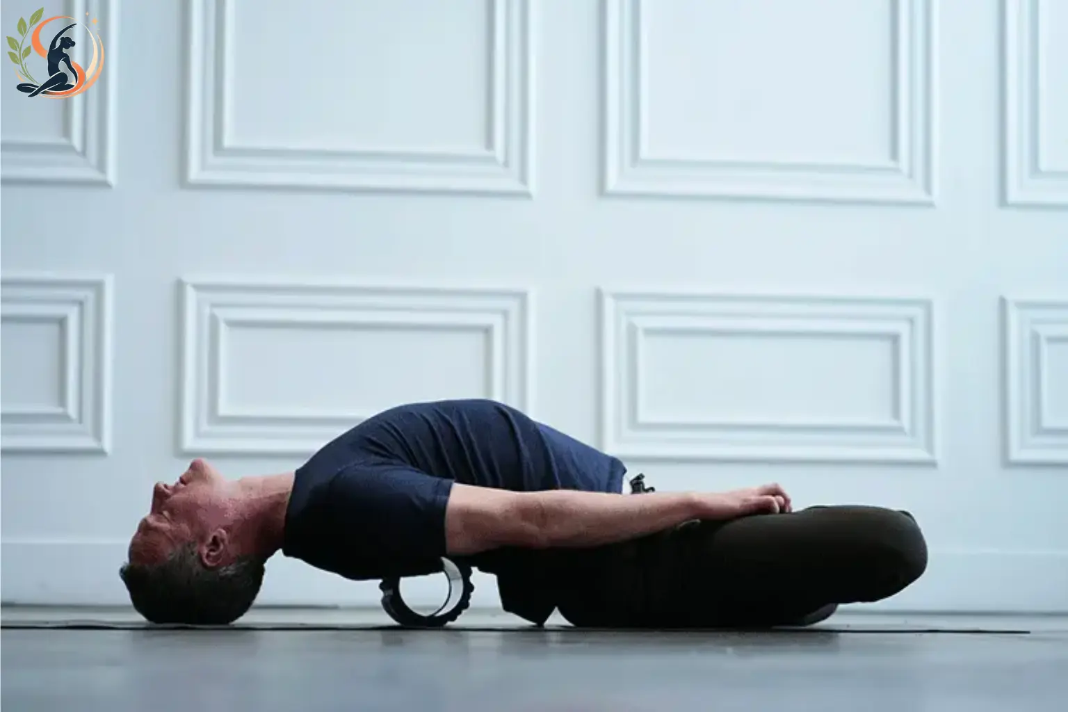 Person practicing backbend yoga poses at home on a yoga mat in a calm setting.