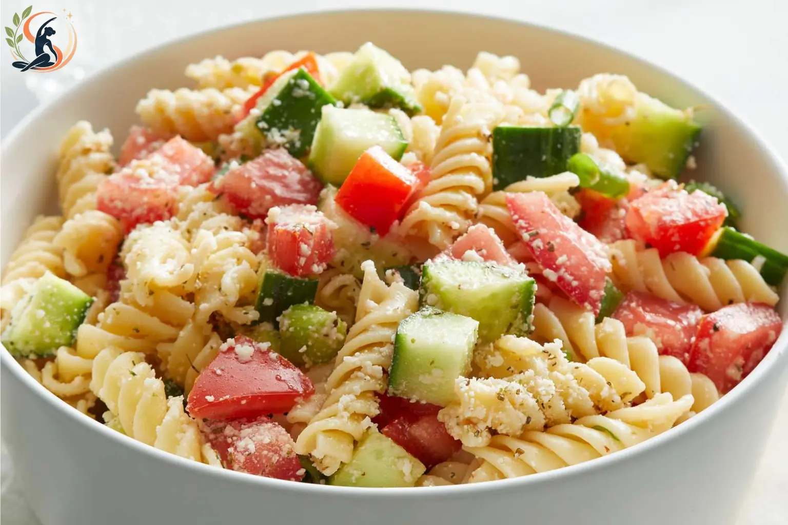 Healthy pasta salads with tuna, roasted tomatoes, arugula, shrimp, corn and avocado